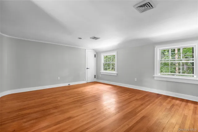a swimming pool with outdoor seating and yard