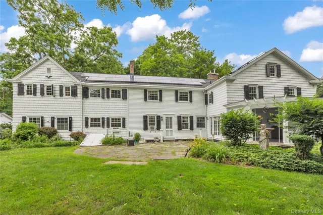a outdoor living space with furniture and garden view