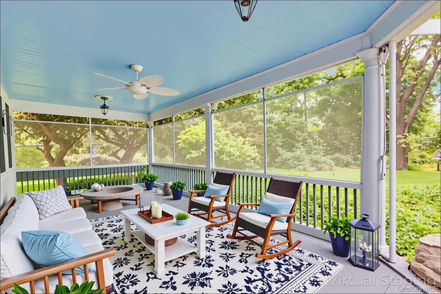 an empty room with large windows