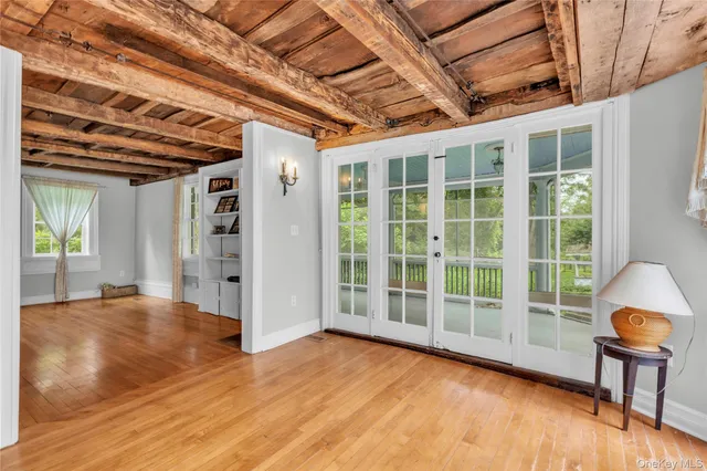 a view of livingroom with furniture wooden floor and window