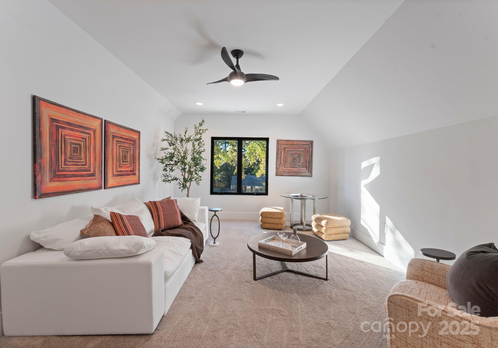 4641 Connecting Road Charlotte, NC 28209 - Photo 35 of 48 a living room with furniture and a large window