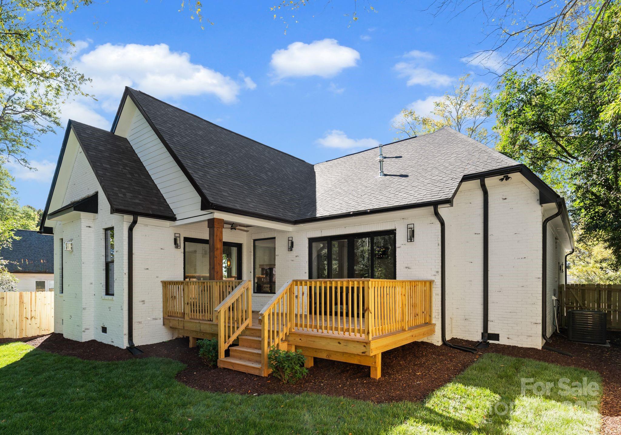 4641 Connecting Road Charlotte, NC 28209 - Photo 42 of 48 a house view with a garden space