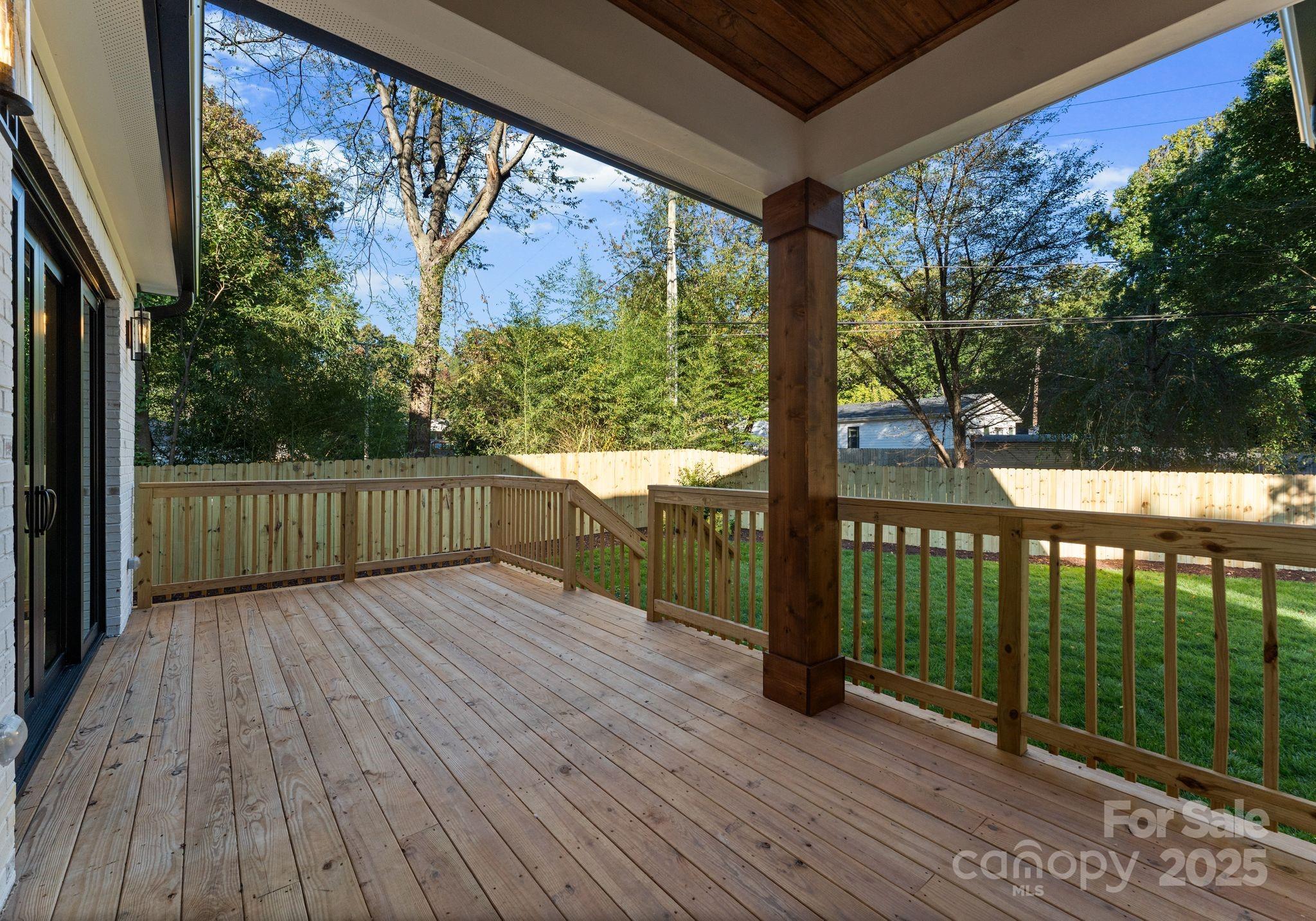 4641 Connecting Road Charlotte, NC 28209 - Photo 46 of 48 a view of a porch with wooden floor and outdoor space