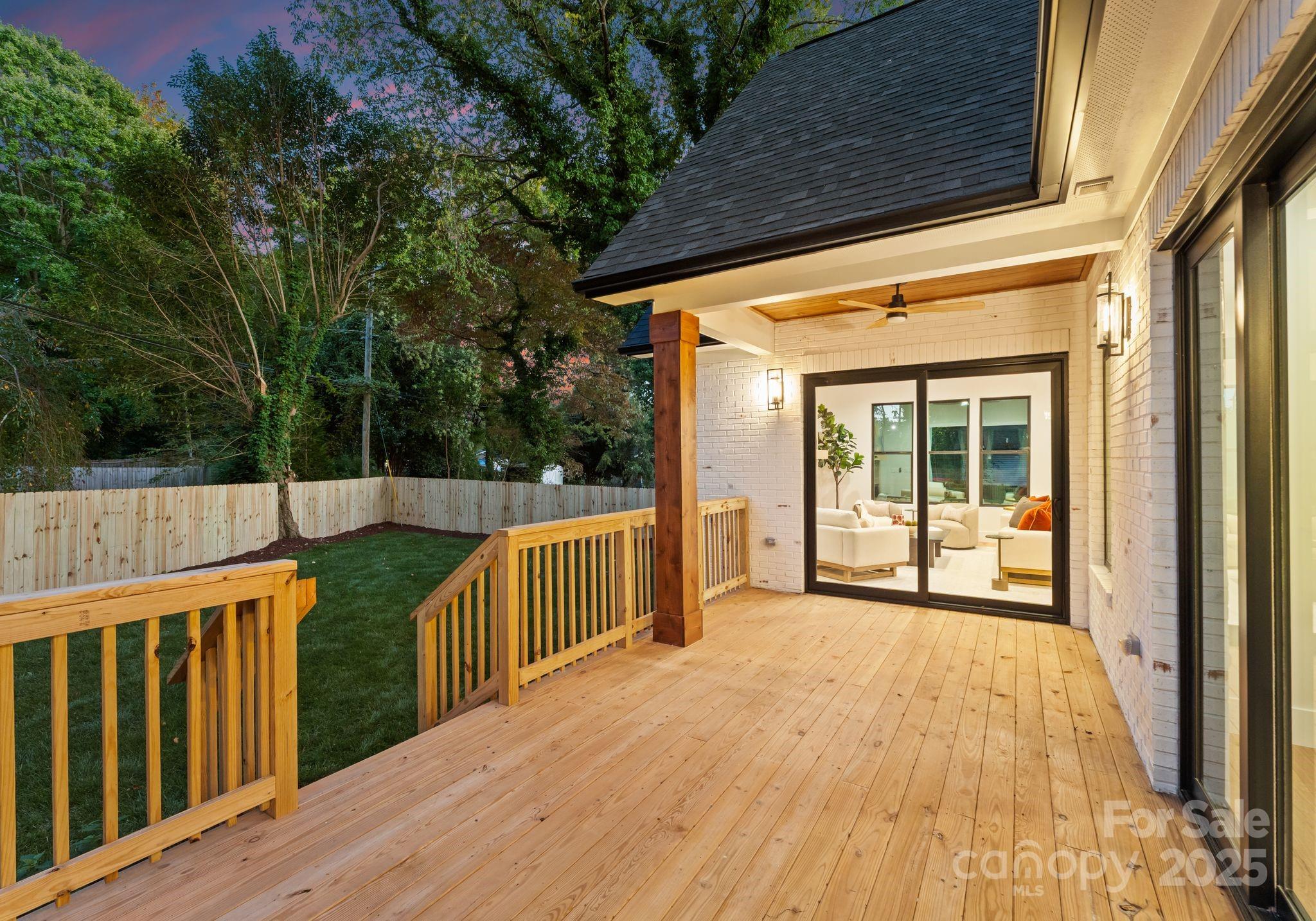 4641 Connecting Road Charlotte, NC 28209 - Photo 7 of 48 a view of balcony with wooden floor and seating space