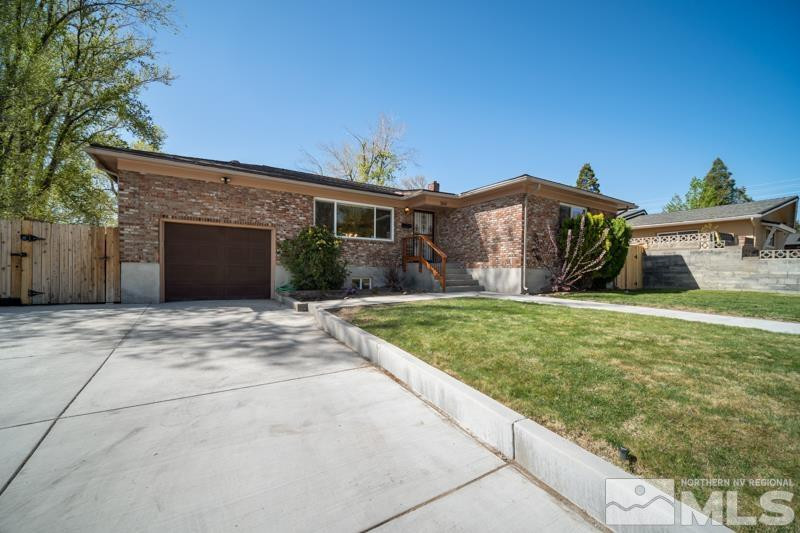 360 Sunset Drive Reno, NV 89509 - Photo 1 of 22 a view of a house with a yard