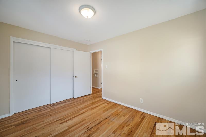360 Sunset Drive Reno, NV 89509 - Photo 12 of 22 a view of an empty room with wooden floor