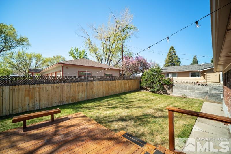 360 Sunset Drive Reno, NV 89509 - Photo 17 of 22 a view of a backyard with a bench