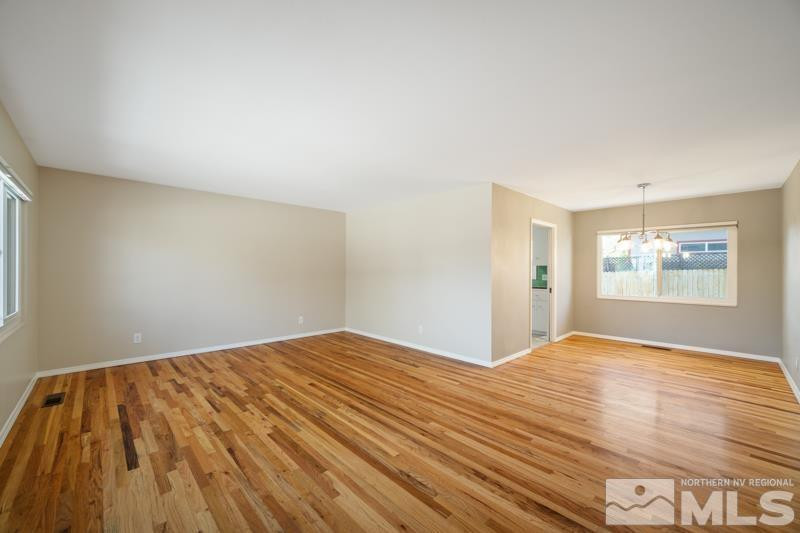 360 Sunset Drive Reno, NV 89509 - Photo 2 of 22 a view of empty room with wooden floor