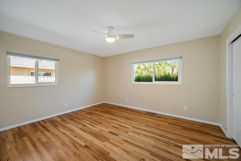 360 Sunset Drive Reno, NV 89509 - Photo 10 of 22 a view of a room with wooden floor and window