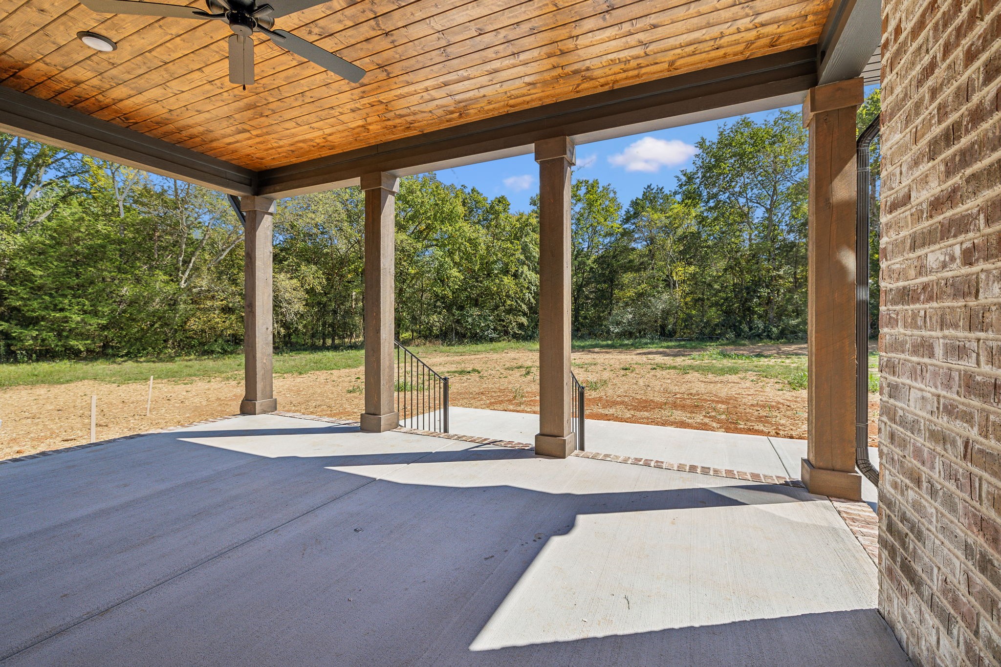 8625 Twelve Corners Road Lascassas, TN 37085 - Photo 23 of 25 a view of a room with wooden floor and outdoor space