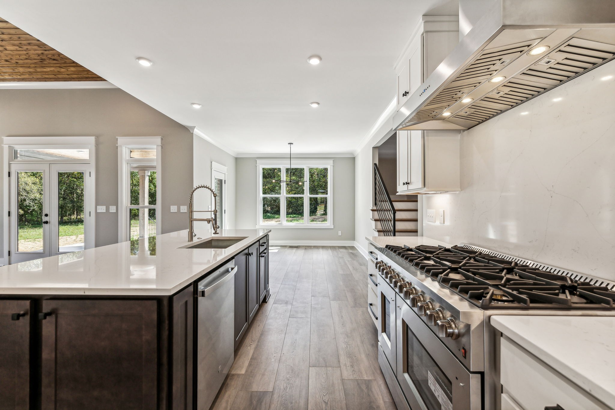 8625 Twelve Corners Road Lascassas, TN 37085 - Photo 10 of 25 a kitchen with granite countertop a stove and a sink