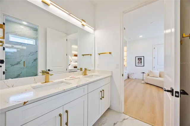 a bedroom with a bed and a microwave