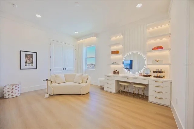 a bedroom with a bed and a cabinets