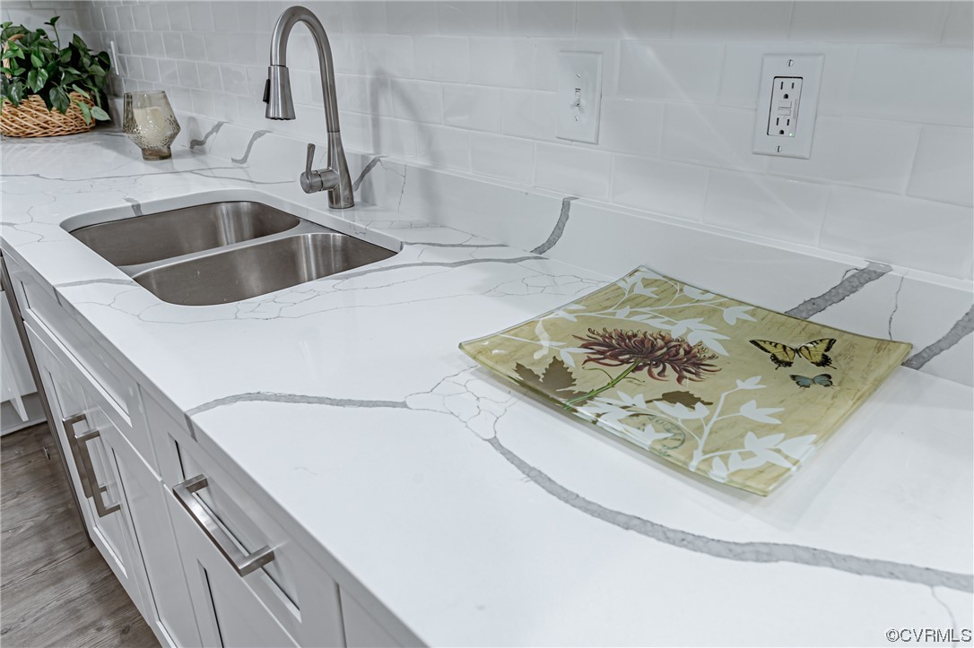 4629 Coldstream Drive Richmond, VA 23234 - Photo 16 of 36 a kitchen with a sink and a stove top oven