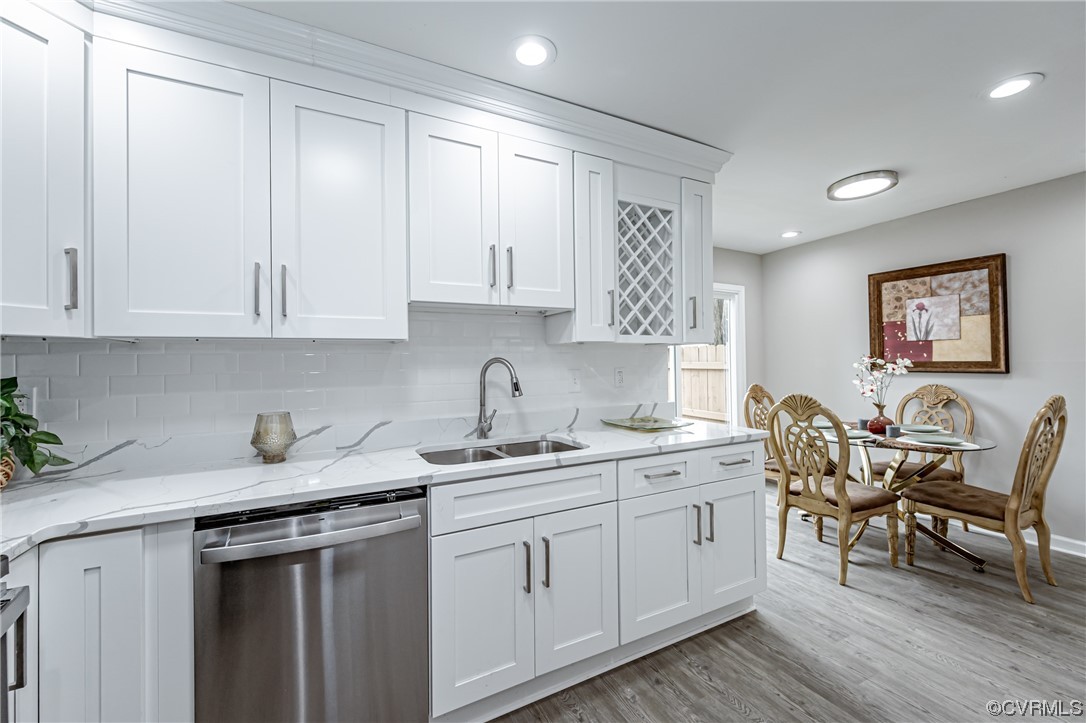 4629 Coldstream Drive Richmond, VA 23234 - Photo 19 of 36 a kitchen with stainless steel appliances granite countertop a sink and cabinets