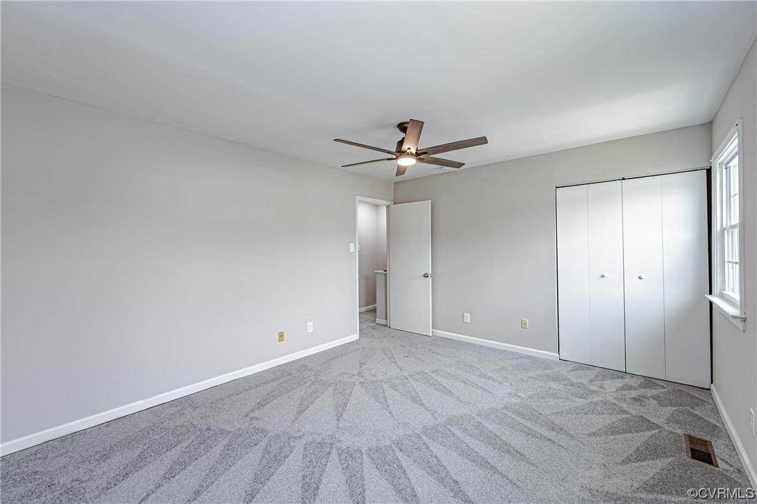 4629 Coldstream Drive Richmond, VA 23234 - Photo 29 of 36 a view of an empty room and chandelier fan