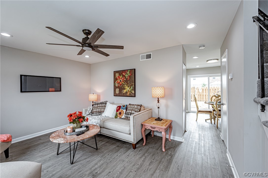 4629 Coldstream Drive Richmond, VA 23234 - Photo 7 of 36 a living room with furniture and a wooden floor