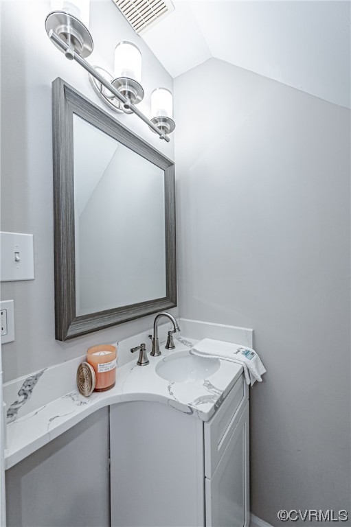 4629 Coldstream Drive Richmond, VA 23234 - Photo 8 of 36 a bathroom with a sink and a mirror