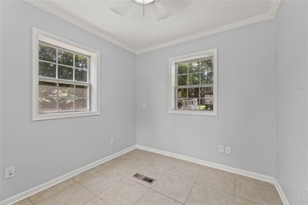 an empty room with windows