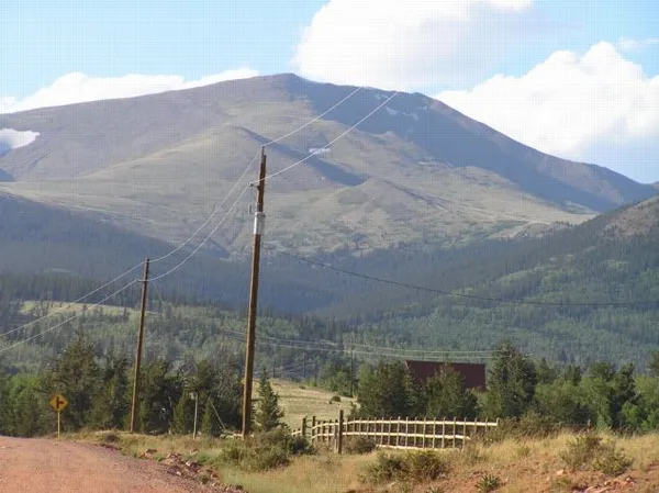 a view of a lake from a balcony