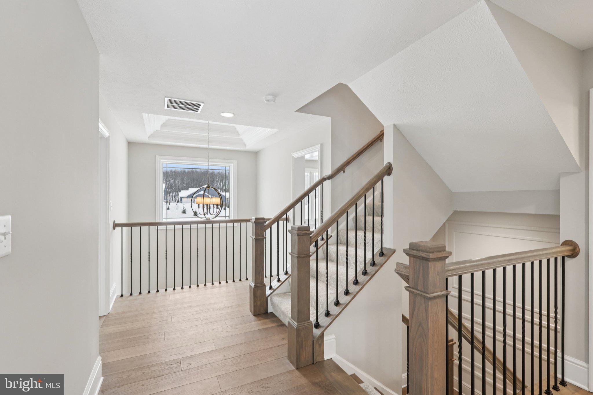 510 Newcomen Road, Unit F1P Exton, PA 19341 - Photo 25 of 56 a view of staircase with railing and white walls