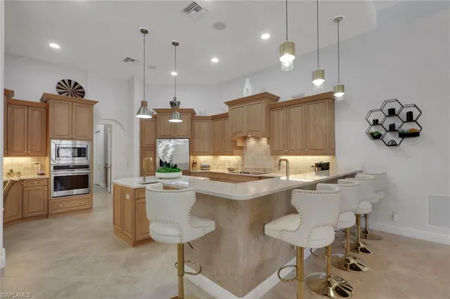 $2,500,000 | 5865 Hammock Isles Circle, Naples, FL 34119