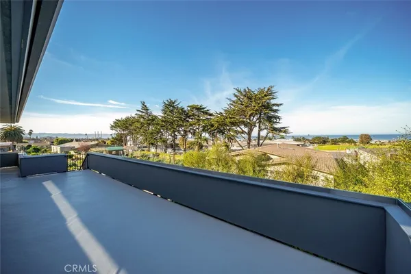 a living room with furniture and couches