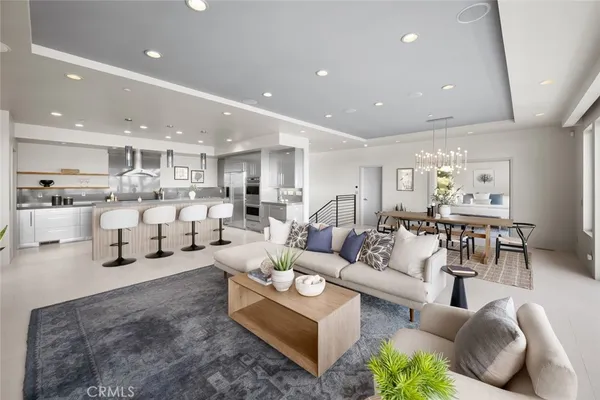 a living room with furniture fireplace and a flat screen tv