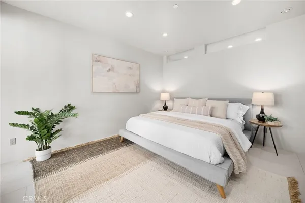 a bathroom with a sink double vanity and a mirror