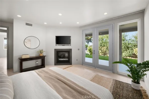 a spacious bathroom with a bathtub and a shower