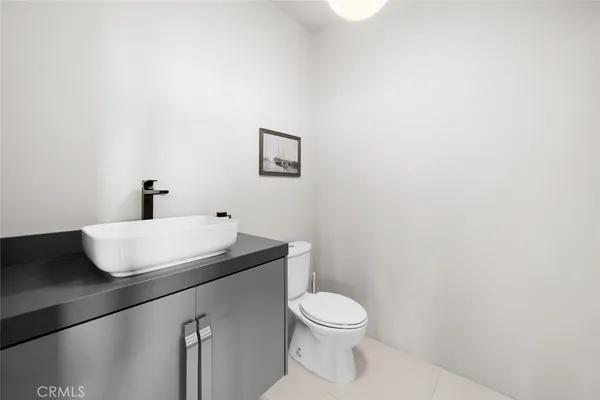 an aerial view of residential houses with outdoor space and swimming pool