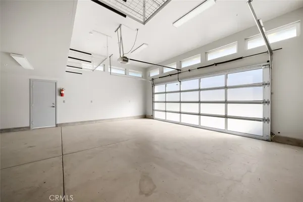 a small white on the side of a house