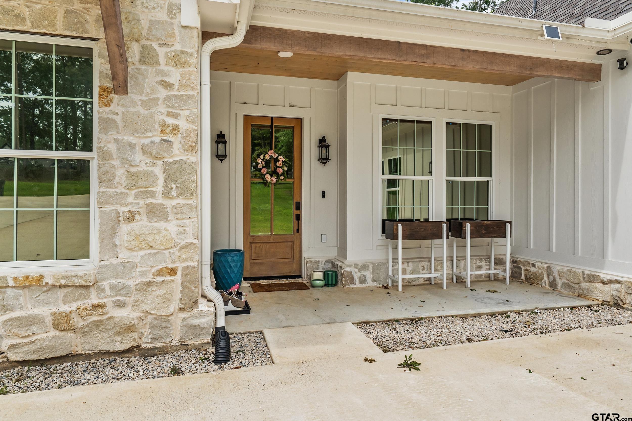 16837 Wilson Road Tyler, TX 75707 - Photo 10 of 44 a front view of a house with a patio