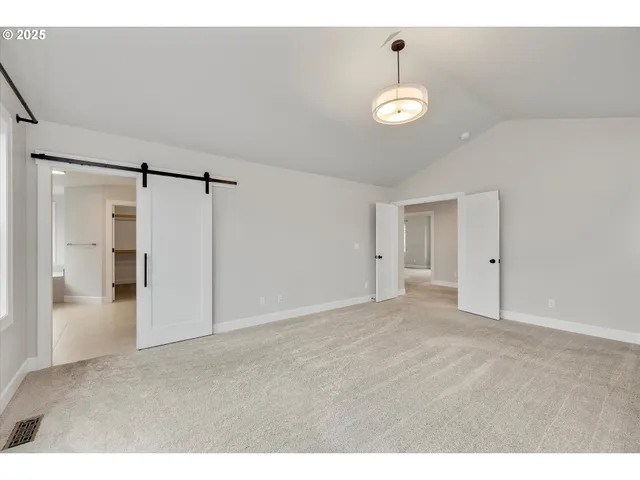 a bathroom with a double vanity sink and mirror