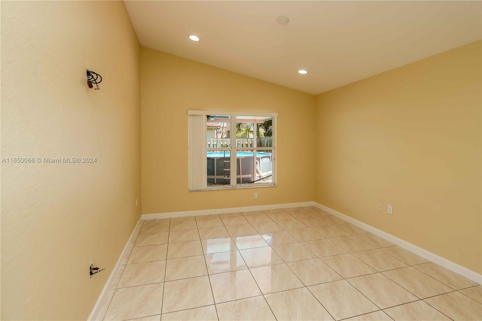 23935 Southwest 108th Place Homestead, FL 33032 - Photo 11 of 30 a view of an empty room