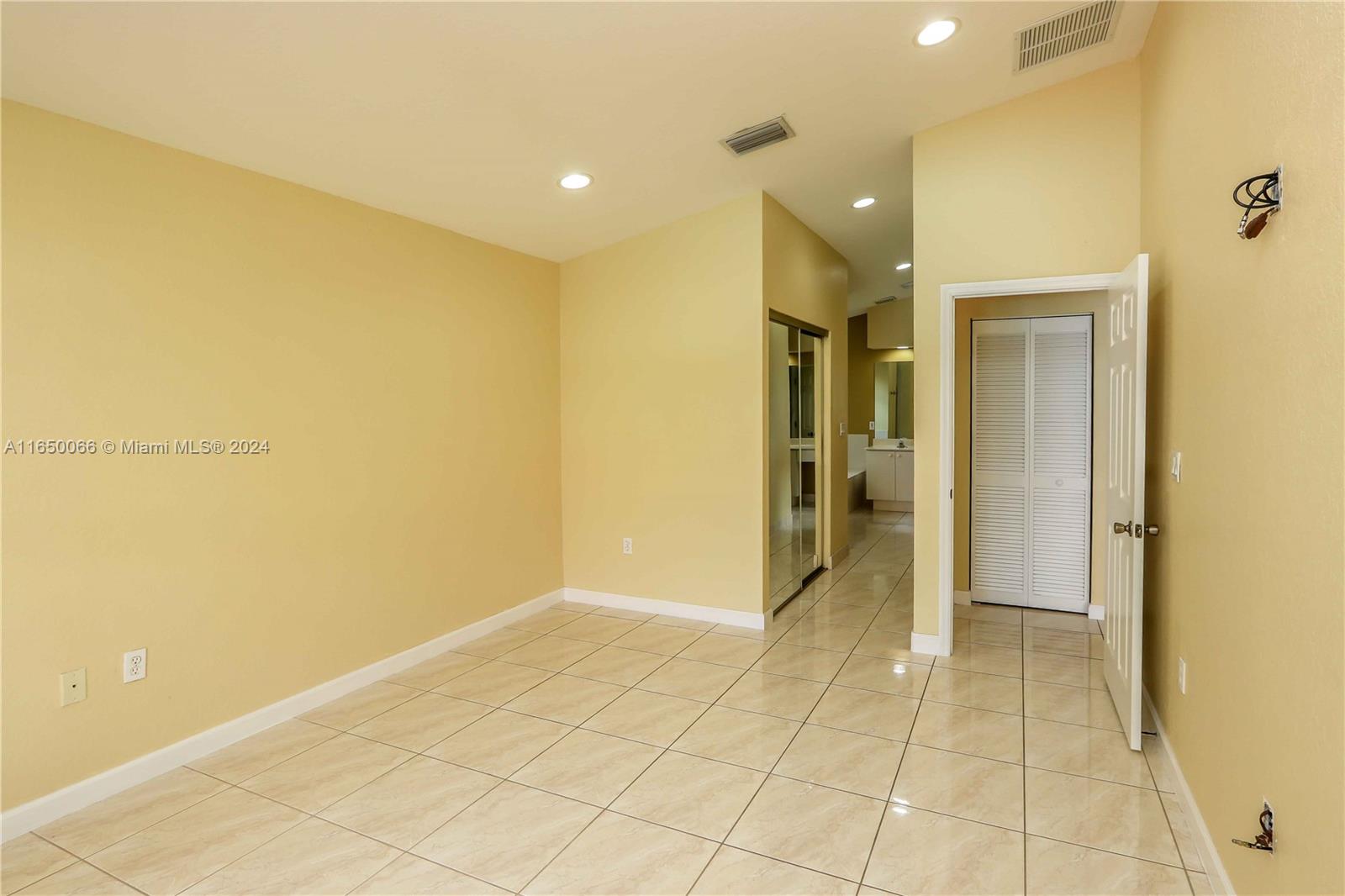 23935 Southwest 108th Place Homestead, FL 33032 - Photo 12 of 30 a view of a hallway with a room