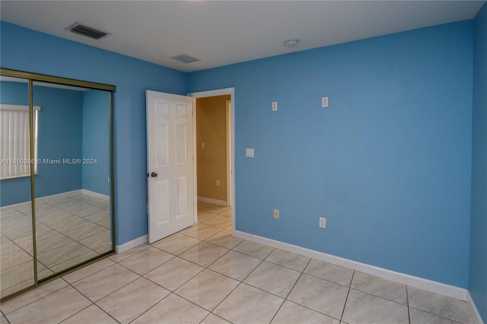 23935 Southwest 108th Place Homestead, FL 33032 - Photo 15 of 30 a view of an empty room