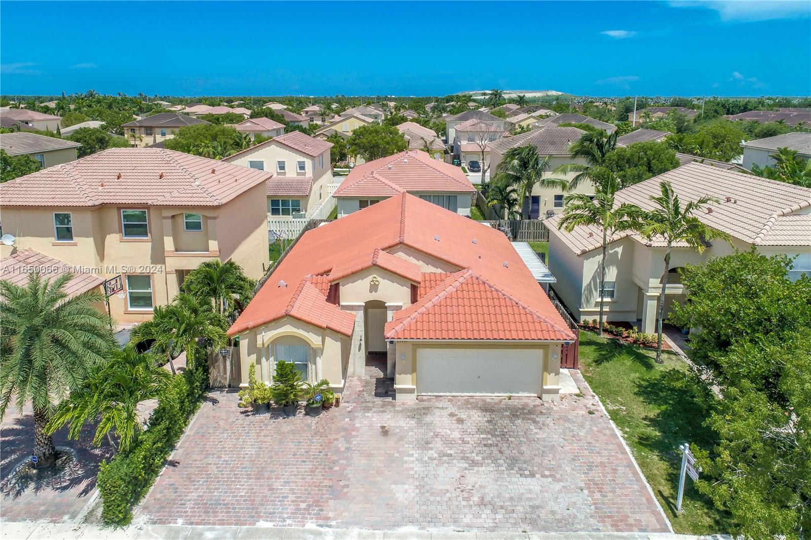 23935 Southwest 108th Place Homestead, FL 33032 - Photo 2 of 30 an aerial view of house with yard