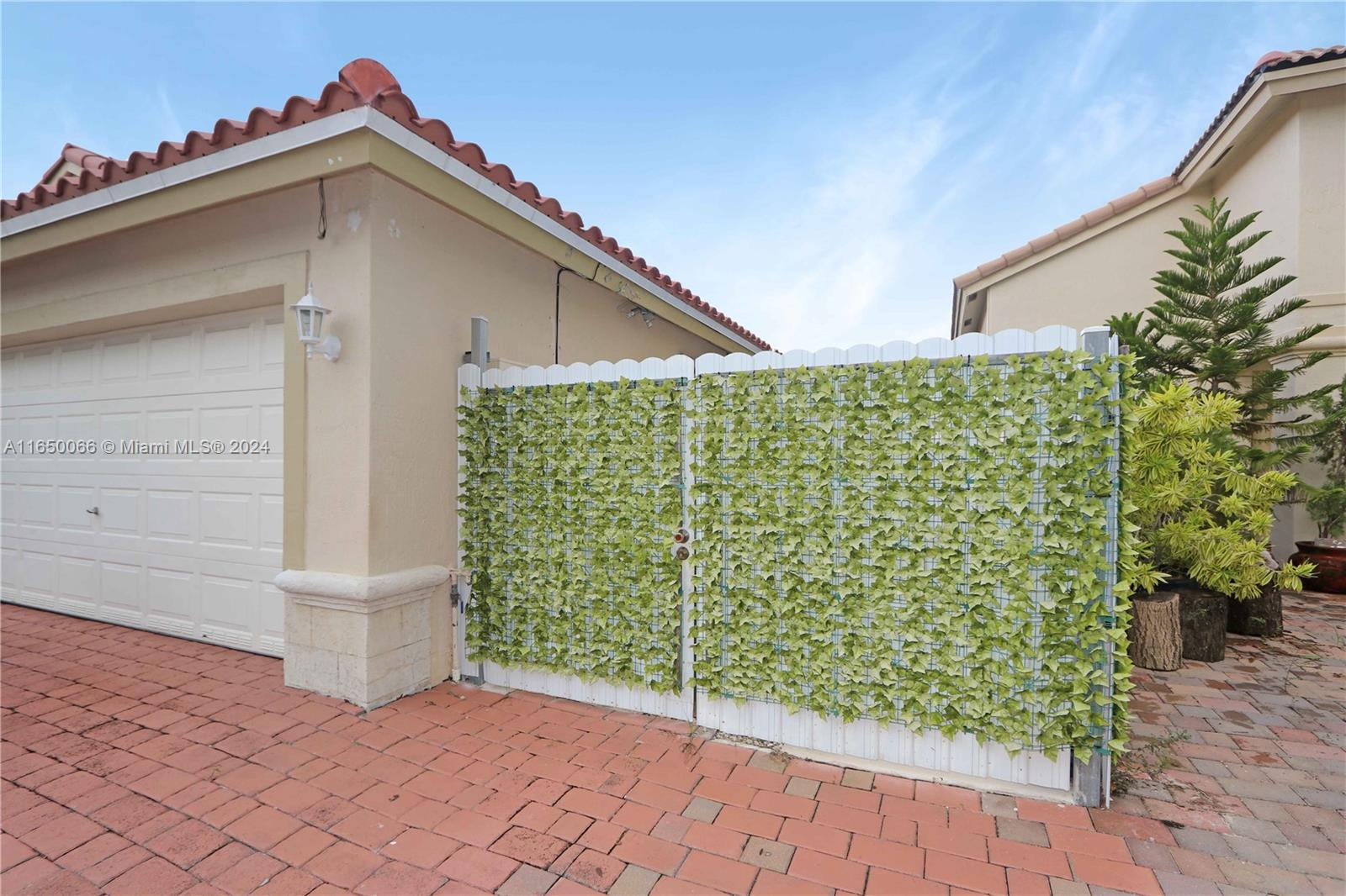 23935 Southwest 108th Place Homestead, FL 33032 - Photo 22 of 30 a view of a back yard of the house