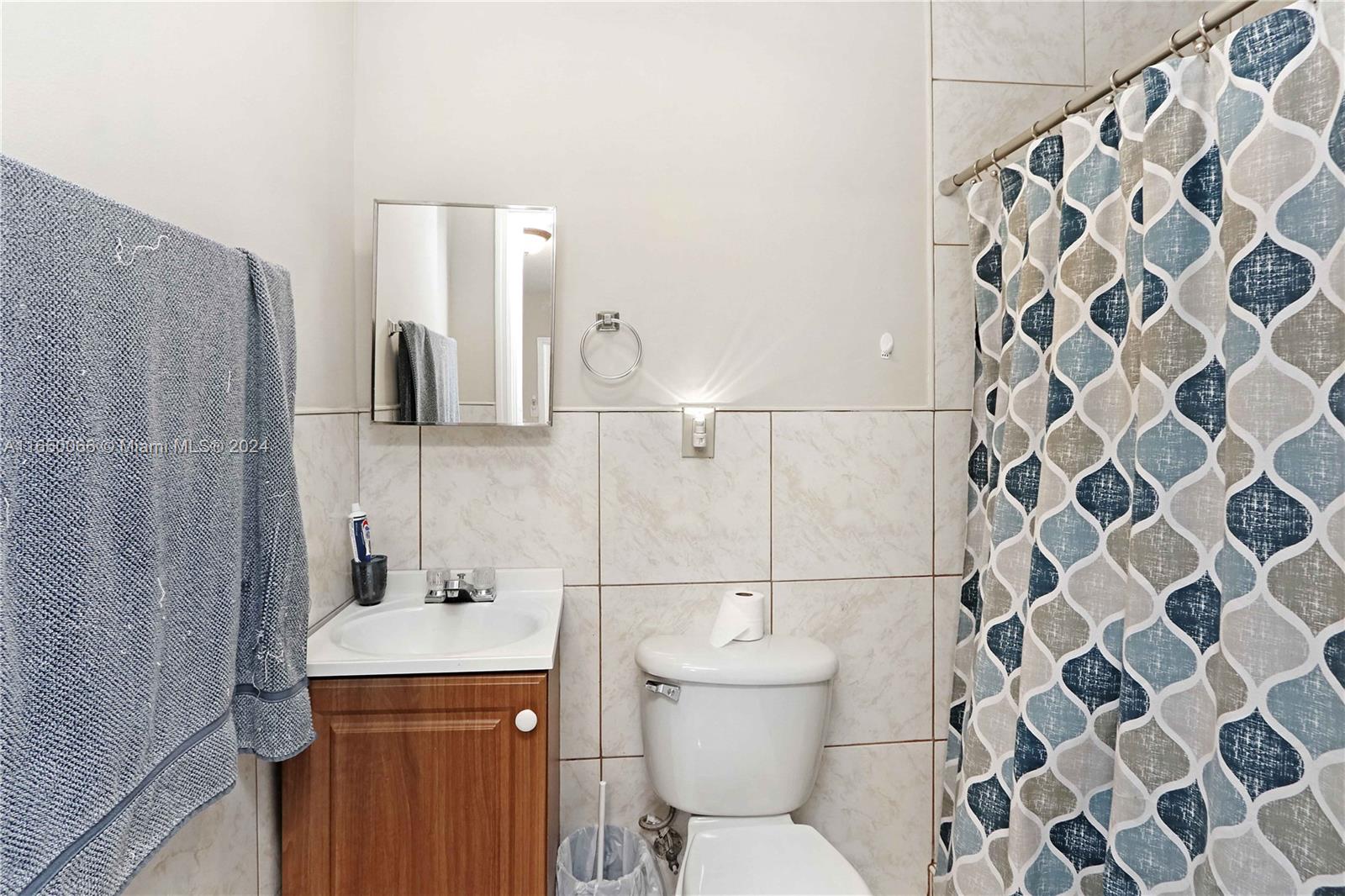 23935 Southwest 108th Place Homestead, FL 33032 - Photo 28 of 30 a bathroom with a toilet and a shower