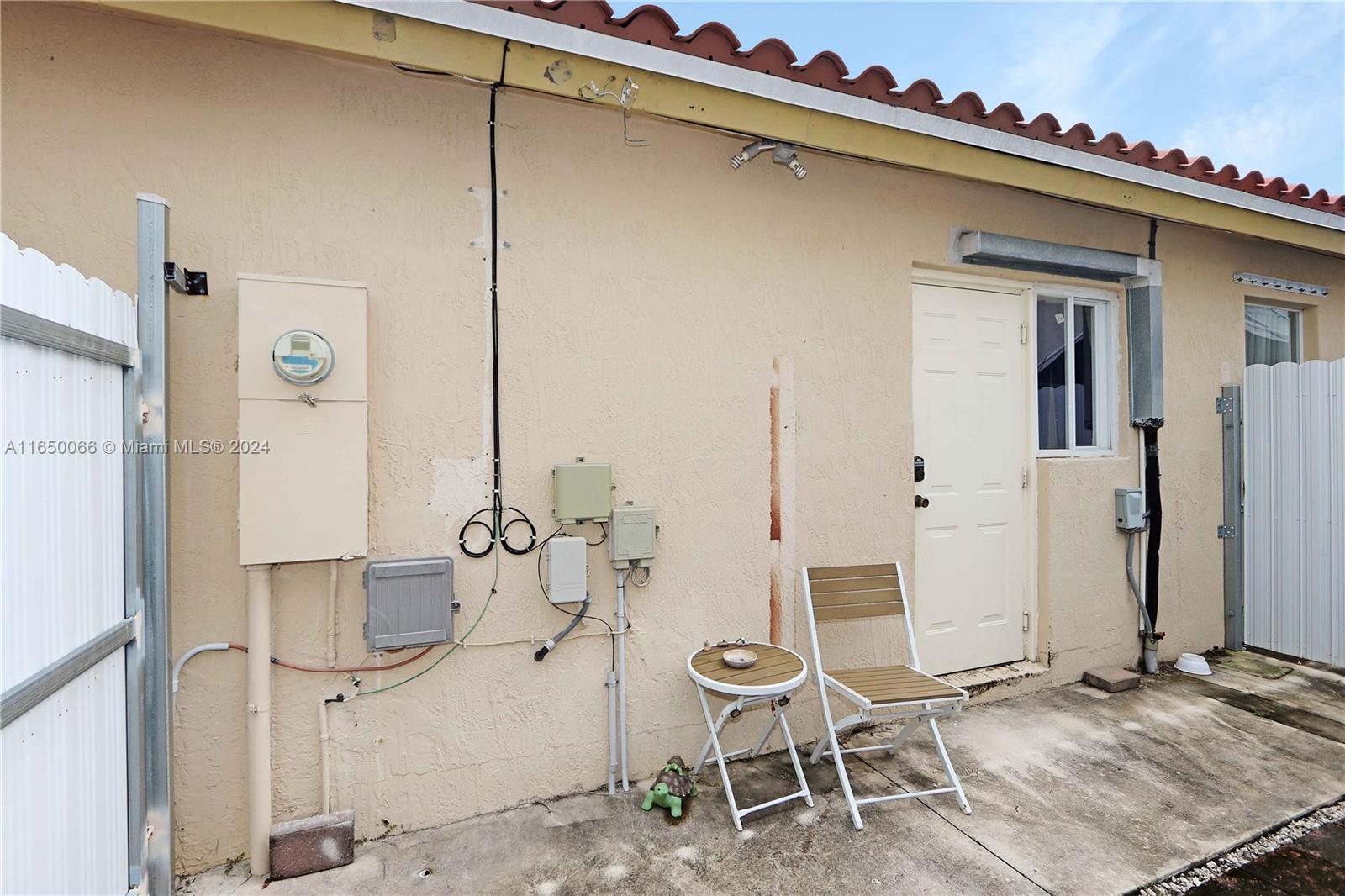 23935 Southwest 108th Place Homestead, FL 33032 - Photo 29 of 30 a bathroom with a sink and mirror with toilet