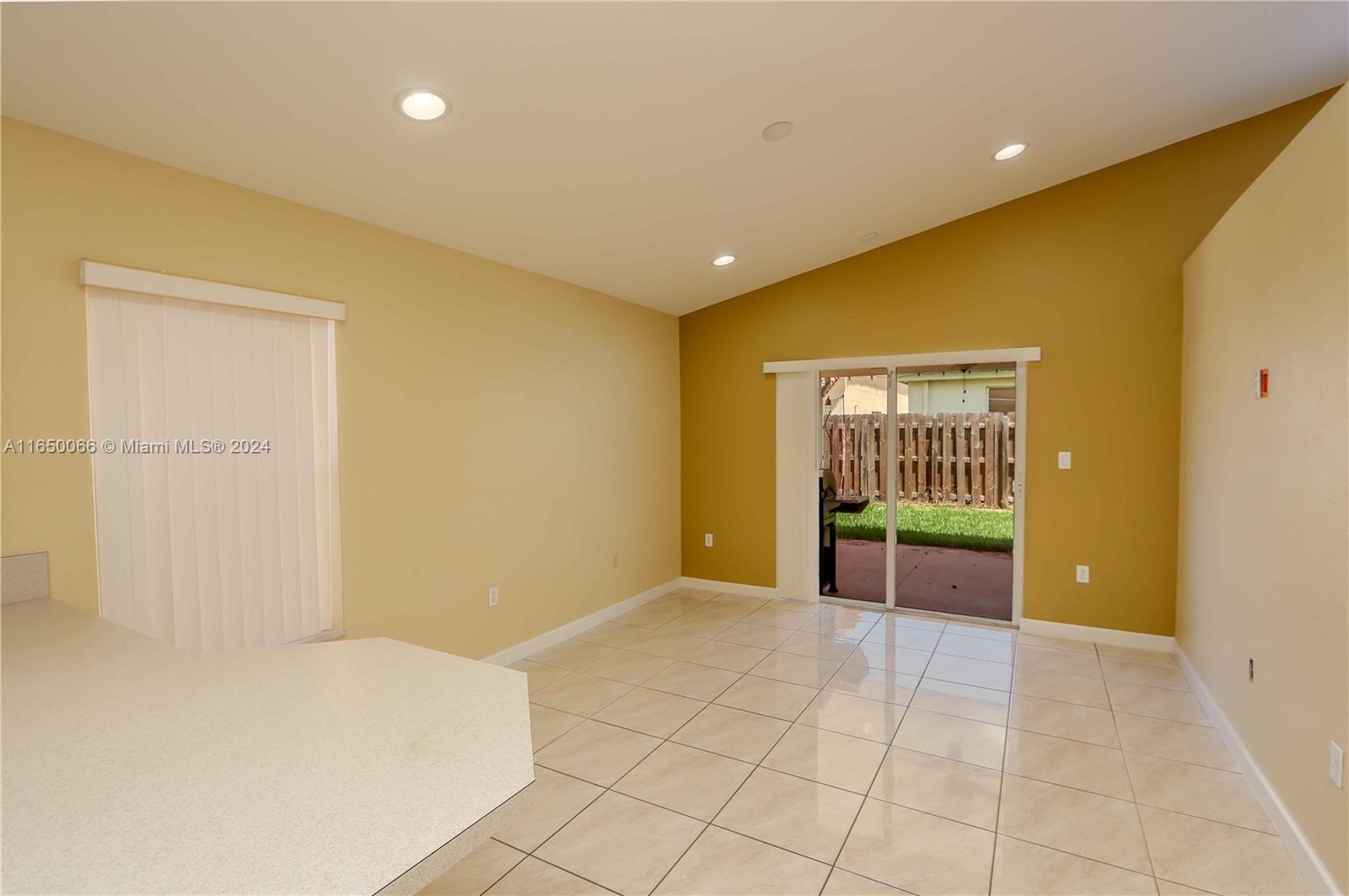 23935 Southwest 108th Place Homestead, FL 33032 - Photo 10 of 30 a view of room with furniture and entryway