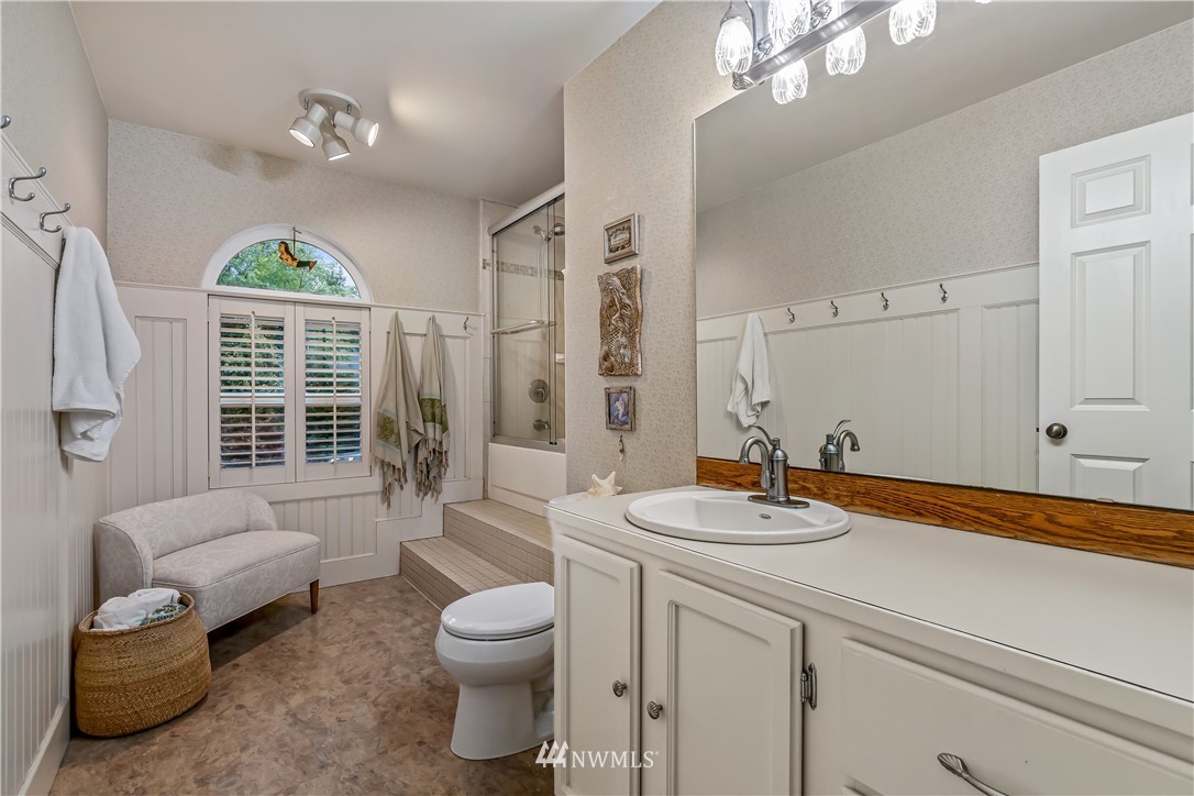 23701 3rd Place West Bothell, WA 98021 - Photo 25 of 31 a spacious bathroom with a granite countertop sink a toilet and shower