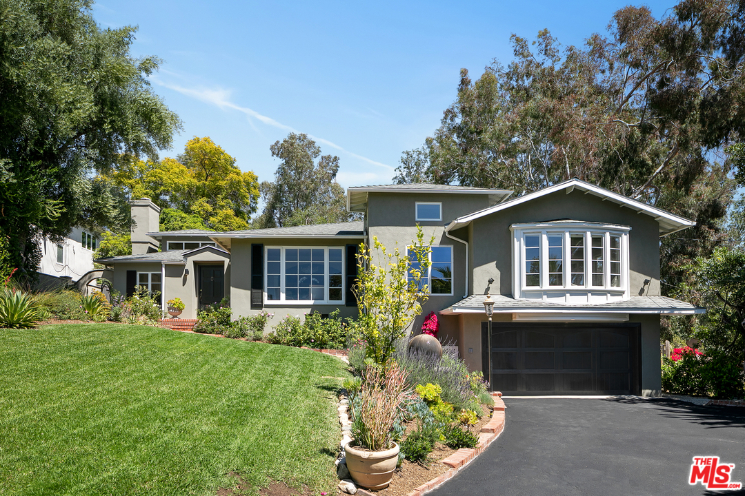 534 Lakeview Road Pasadena, CA 91105 - Photo 2 of 34 a front view of house with yard and green space