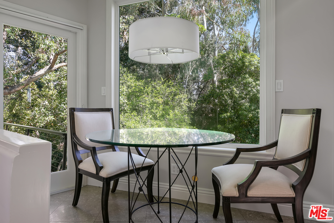 534 Lakeview Road Pasadena, CA 91105 - Photo 15 of 34 a view of a chairs and table in a room