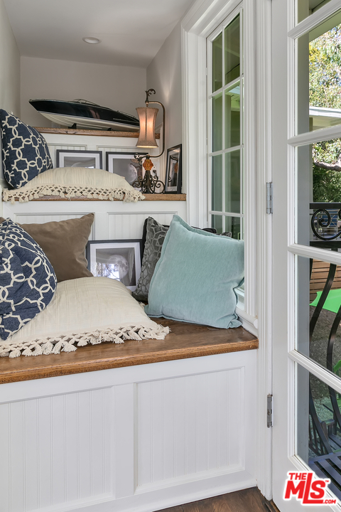 534 Lakeview Road Pasadena, CA 91105 - Photo 21 of 34 a living room with furniture and a floor to ceiling window