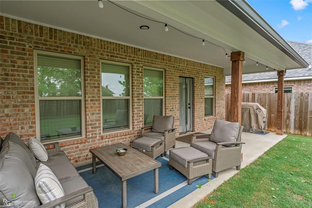 122 Brimestone Loop Benton, LA 71006 - Photo 33 of 33 a outdoor living space with furniture and a patio