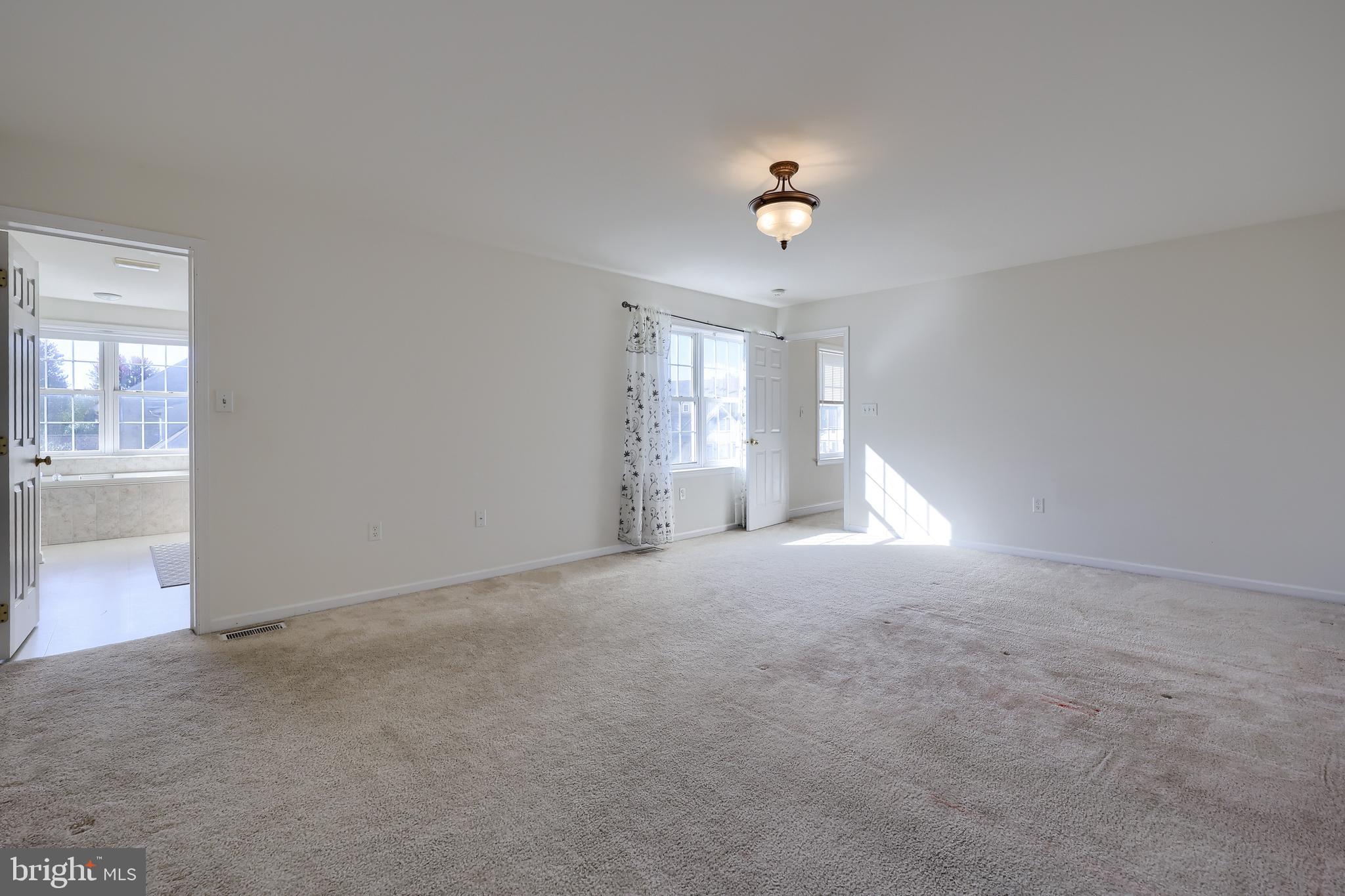 327 Squire Lane Lititz, PA 17543 - Photo 21 of 48 a view of an empty room with a window