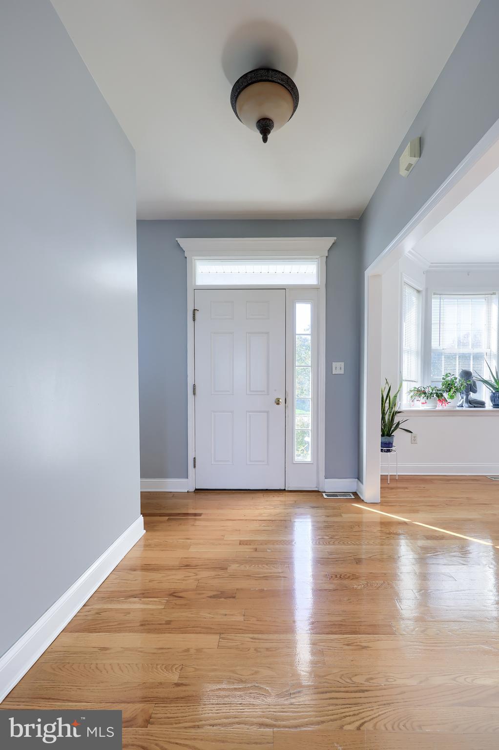 327 Squire Lane Lititz, PA 17543 - Photo 3 of 48 a view of an empty room and wooden floor