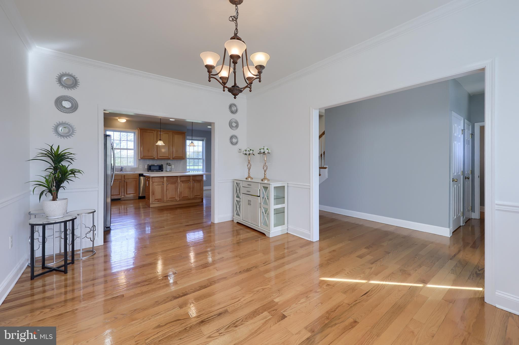 327 Squire Lane Lititz, PA 17543 - Photo 5 of 48 a view of a livingroom with a kitchen and furniture